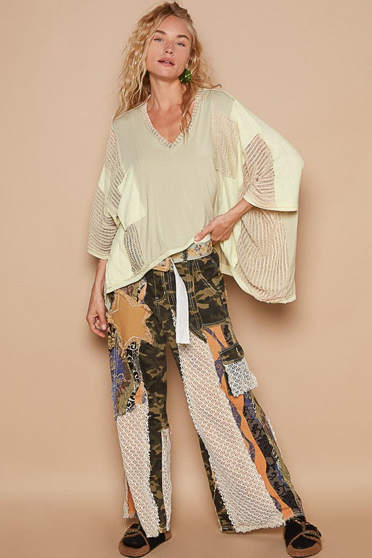 POL Already Famous High-Low Contrast V-Neck Top in Pistachio