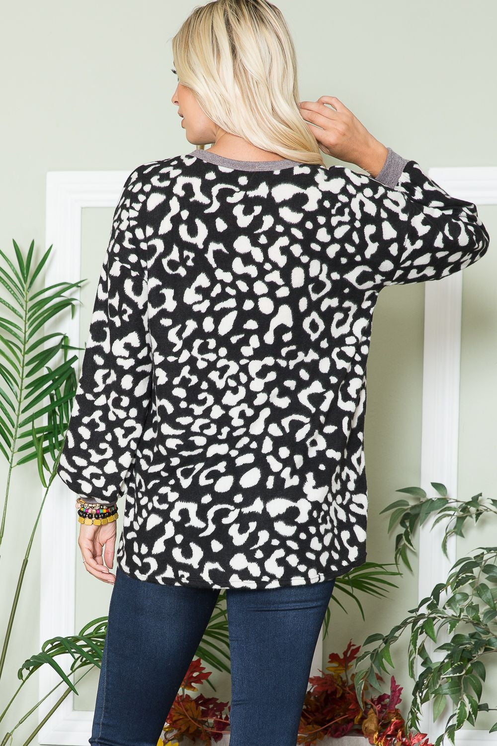 Celeste Embracing Wild V-Neck Long Sleeve Blouse in Black Leopard