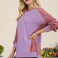 Celeste Painted Moments High-Low Contrast Round Neck Sweatshirt in Lavender