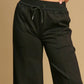 Umgee Too Glam To Give A Damn Drawstring Wide Leg Pants with Pockets in Black