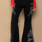 POL Flo Raw Hem Embroidered Flare Pants in Black