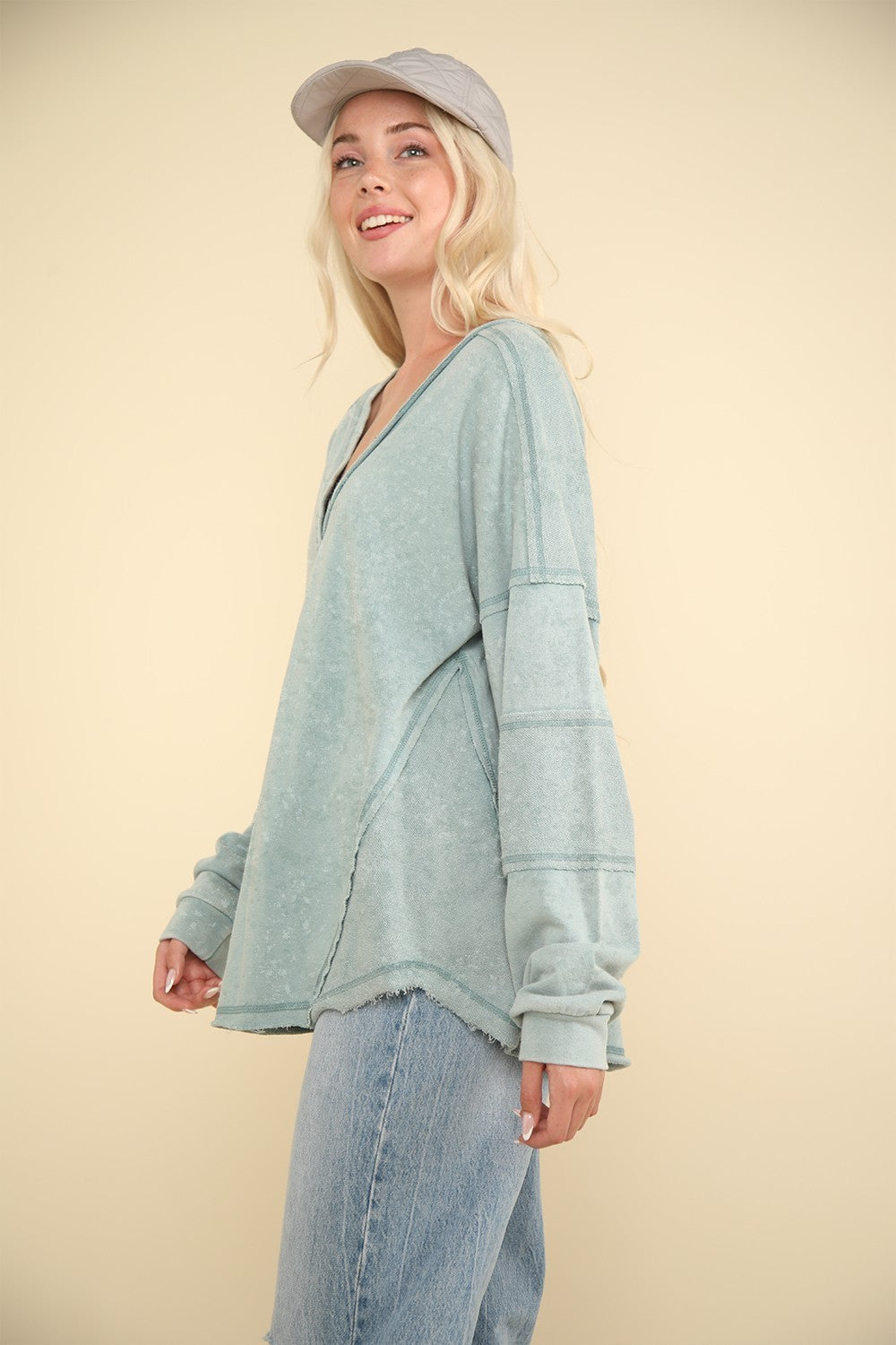 VERY J Here There And Everywhere Washed V-Neck Exposed Seam Knit Top in Sage