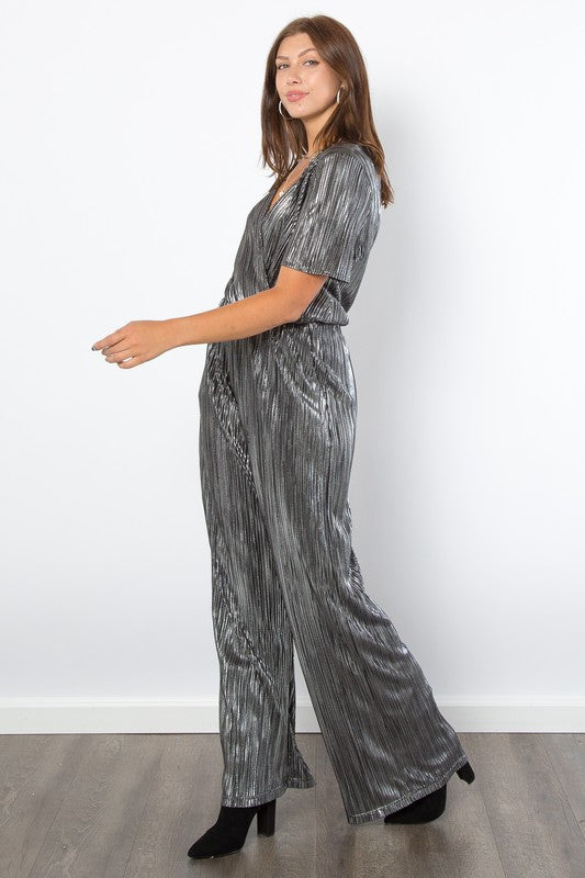 Be Stage Ready To Turn Heads Surplice Short Sleeve Pleated Foil Jumpsuit in Silver