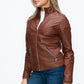 YMI Fuzzy Feels Faux Layered Double-Zipper Jacket with Fuzzy Hood in Brandy