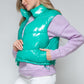 Snobbish A Quilted Touch Zip Up Turtleneck Shiny Quilted Vest in Green