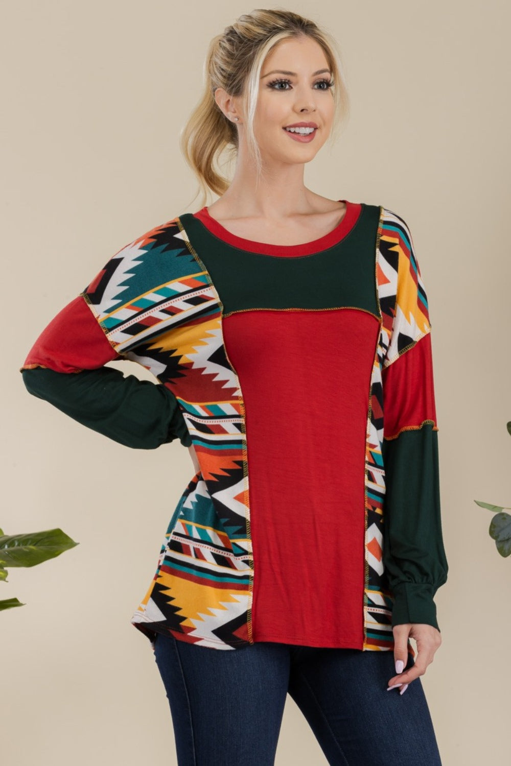 Celeste Simplicity with a Twist Exposed Seam Printed Color Block T-Shirt in Red
