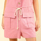 VERY J Chilled Out Half Button Drawstring Sleeveless Romper in Blush