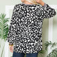 Celeste Embracing Wild V-Neck Long Sleeve Blouse in Black Leopard