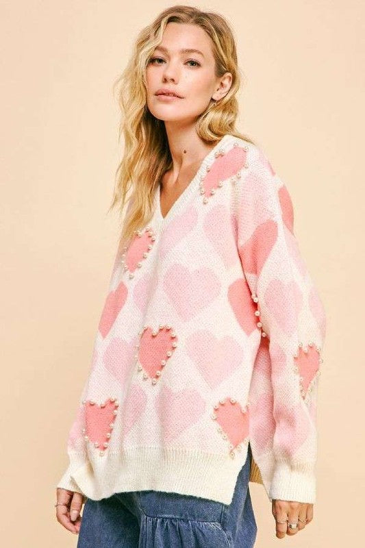 Davi & Dani Hearts of Pearl Side Slit V-Neck Sweater in Cream Multi