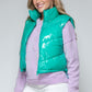 Snobbish A Quilted Touch Zip Up Turtleneck Shiny Quilted Vest in Green