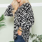 Celeste Embracing Wild V-Neck Long Sleeve Blouse in Black Leopard