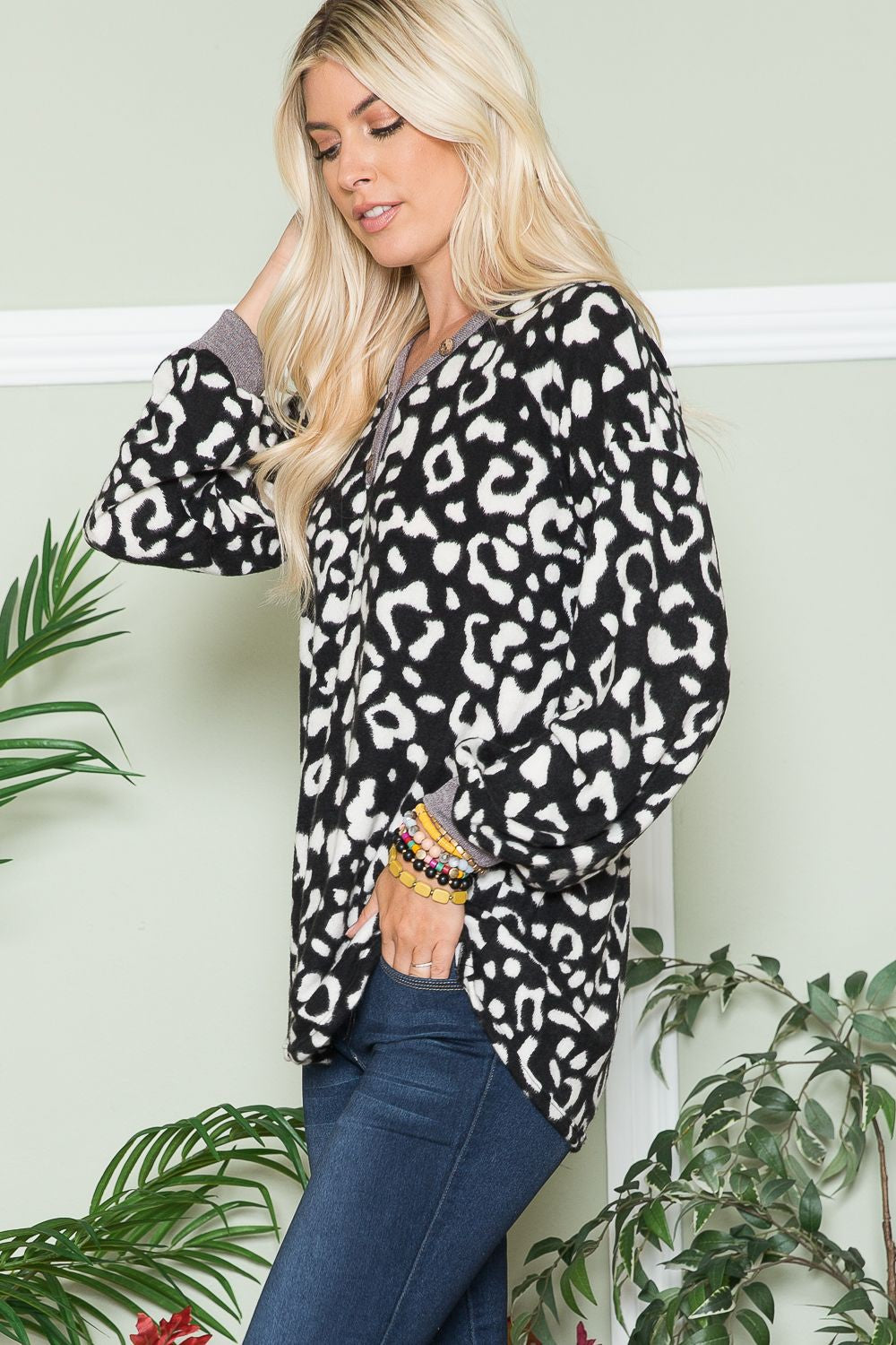 Celeste Embracing Wild V-Neck Long Sleeve Blouse in Black Leopard