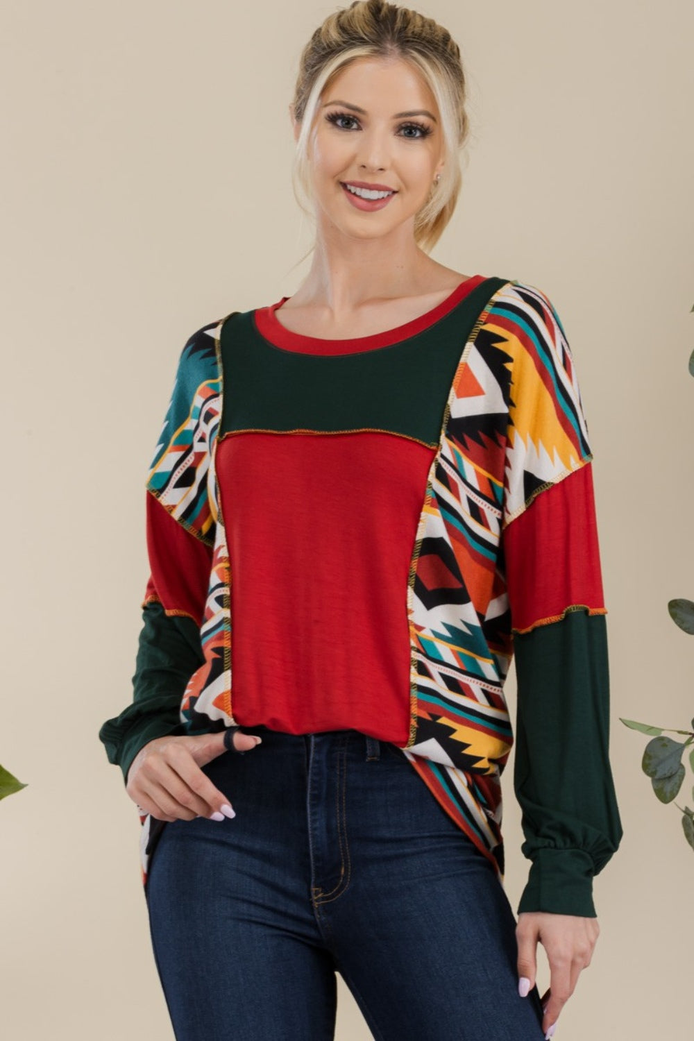 Celeste Simplicity with a Twist Exposed Seam Printed Color Block T-Shirt in Red