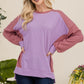 Celeste Painted Moments High-Low Contrast Round Neck Sweatshirt in Lavender