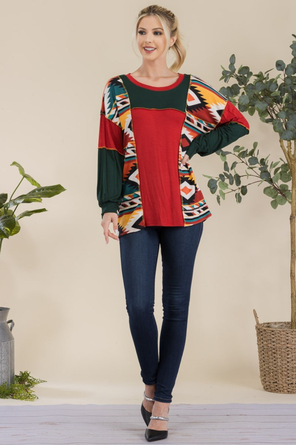 Celeste Simplicity with a Twist Exposed Seam Printed Color Block T-Shirt in Red