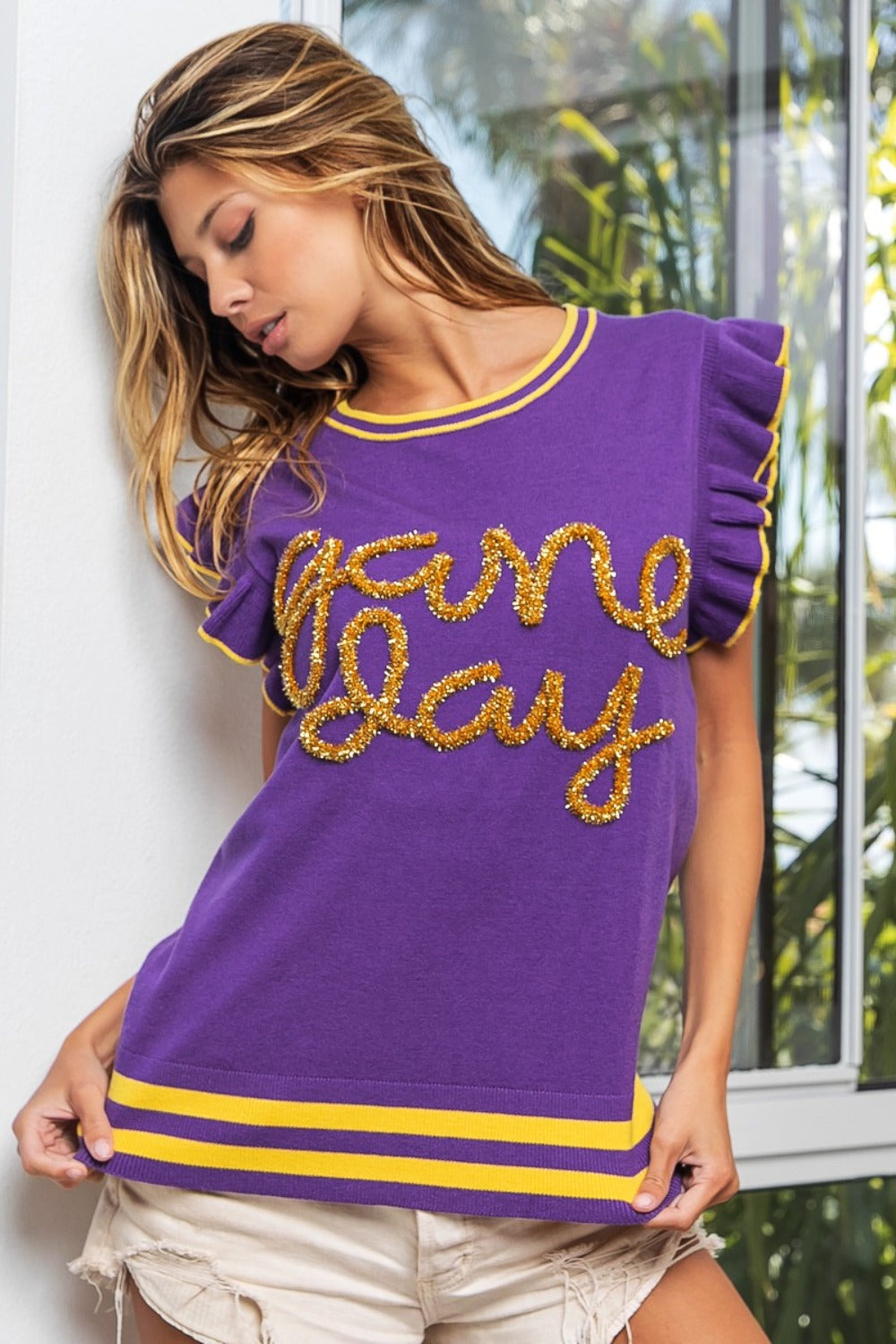 BiBi Game Day Letter Contrast Trim Ruffled Sleeveless Sweater in Purple/Gold