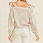 MABLE Tied Up Off Shoulder Self Tie Strap Button Down Sweater