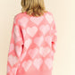 Davi & Dani Hearts of Pearl Side Slit V-Neck Sweater in Pink Multi