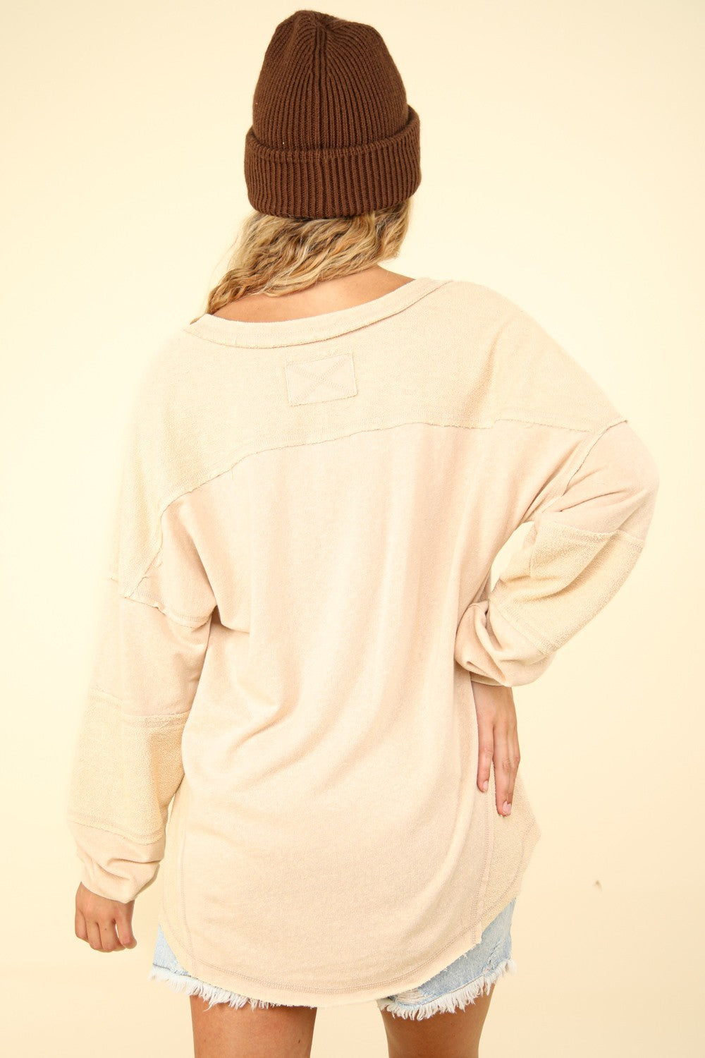 VERY J Here There And Everywhere Washed V-Neck Exposed Seam Knit Top in Beige