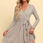 Warm Today, Cold Tomorrow Long Sleeve Tie Waist Ruffle Hem Dress