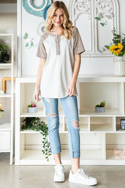 Heimish Be Bold Animal Print Half Button Short Sleeve Top